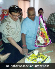 Dr.Abhay Khandekar Cutting Cake
