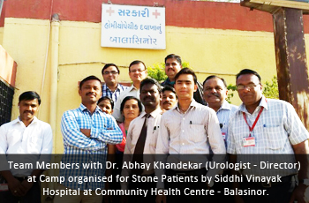 Team Members with Dr. Abhay Khandekar (Urologist - Director) at Camp organised for Stone Patients by Siddhi Vinayak Hospital at Community Health Centre - Balasinor.