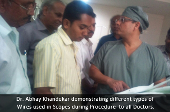 Dr. Abhay Khandekar demonstrating different types of  Wires used in Scopes during Procedure  to all Doctors.  