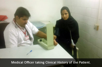 Medical Officer taking Clinical History of the Patient.